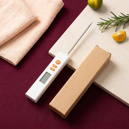 Unbranded white thermometer with plain kraft packaging